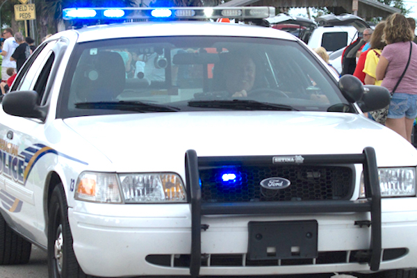 Motorcycle clips vehicle on Sebastian Boulevard.