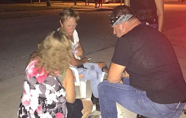 Earl's Hideaway patrons help female victim who was hit by an older model Ford Mustang in Sebastian.