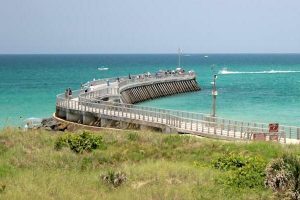 Three boaters rescued near Sebastian Inlet.