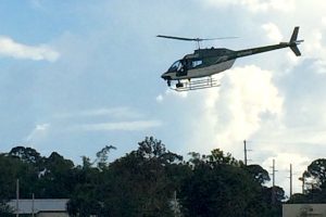 Deputies rescue five people after two boats capsize near Sebastian Inlet.