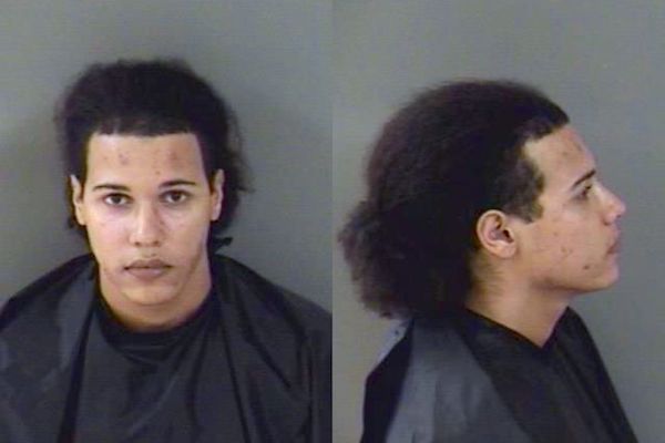 Man kicks dog for eating his food in Vero Beach, Florida.