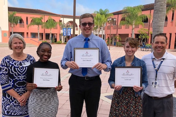 Left to right: Susan Lovelace, LRJF Board Member; Sebastian River High School Students Ruth Philippe, James LaBranche, and Lucille Stull; Jaime Sturgeon, IB Coordinator at Sebastian River High School.