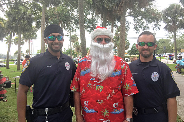 Christmas in July benefits Shop With A Cop in Sebastian, Florida.