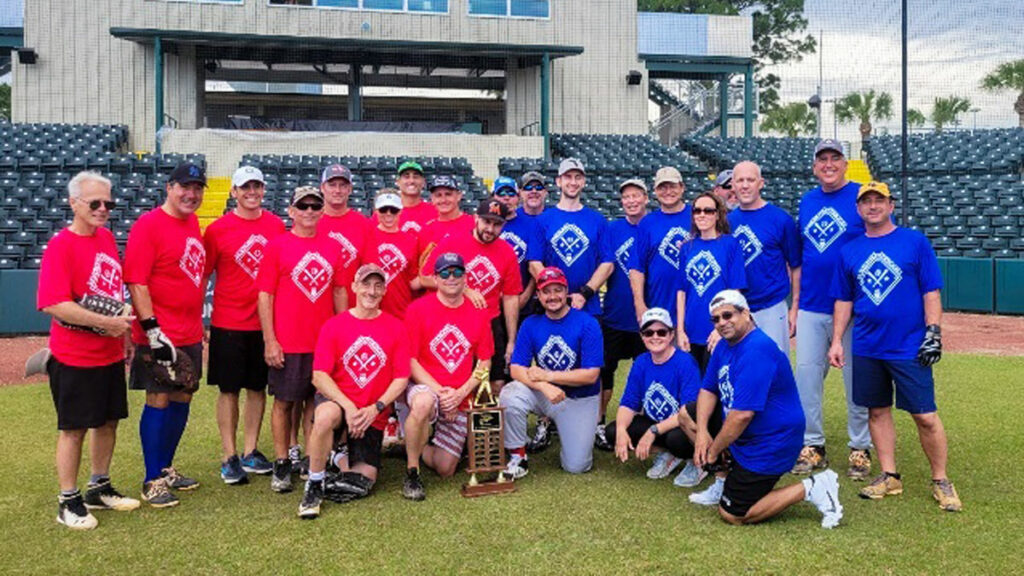 From Left to Right: Jawbones (red) - Robert Nall, Michael Zito, Dane Ullian, James Harping, Jason Odom, Barry Segal, Eva Lauer, Jesse Larsen, Andrew Metcalf, Justin Barenborg, Raul Perez. Sawbones (blue) - Miguel Rivera MD, Marc McCain MD, Jason Stack MD, Alan Friedenstab MD, Geoff Wolf MD, Amber Dunn MD, Brett Haake MD, Clay Greeson MD, Jeff Livingston MD, Tom Baudo MD, Santos Ruiz- Cordero MD, Pamela Kirwin MD, Sri Yerneni MD