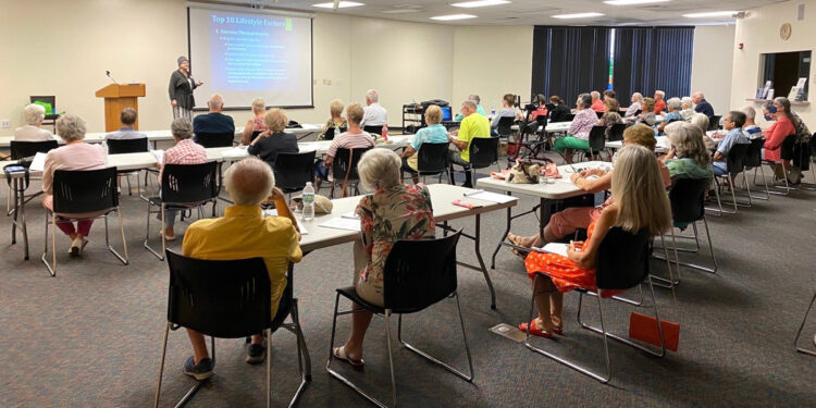 Susan Micheel, Education Coordinator, facilitates a Total Memory Workout class at the North County Library. (Credit: Courtney Sanchez)