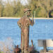 A statue of Paul Kroegel, a significant figure who established Pelican Island as a bird sanctuary in Sebastian, Florida.