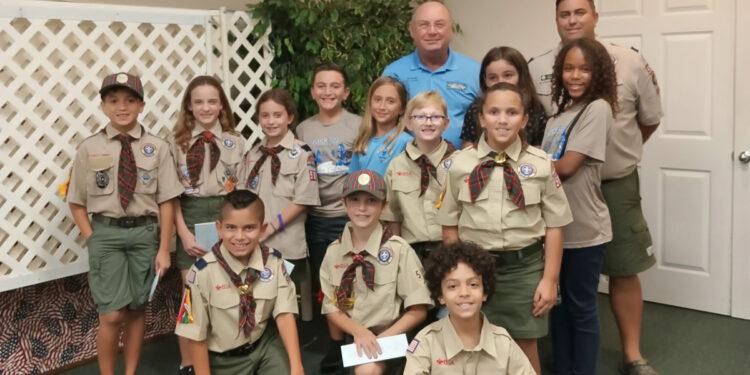 Councilman Ed Dodd (in the blue shirt) answers questions from Sebastian Cub Scouts