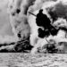 The infamous Japanese attack on Pearl Harbor, Hawaii, is shown in this Dec. 7, 1941 file photo. The USS Arizona is pictured in flames after being hit. (Credit: AP)