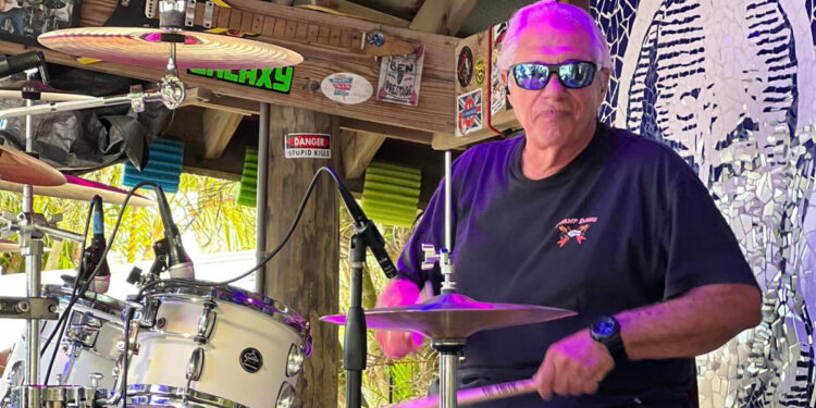 Michael Evanchik plays drums for the Swamp Dawg Band in Sebastian, Florida.