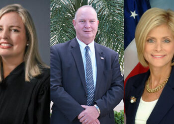 From left to right: County Court Judge Robyn Stone, County Commissioner Deryl Loar, and Supervisor of Elections Leslie Swan.