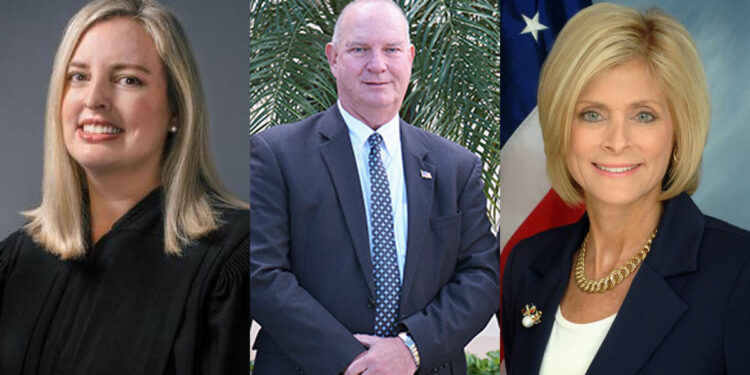 From left to right: County Court Judge Robyn Stone, County Commissioner Deryl Loar, and Supervisor of Elections Leslie Swan.