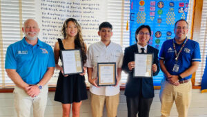 Pictured: Student Coordinator Adam Preuss with Mia Harrel, Sebastian Ramos, Ace McLain and Jaime Sturgeon, SRHS IB Counselor