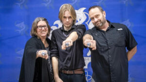 Holly Hamilton (left) with her son Patrick (center) and husband James (right)